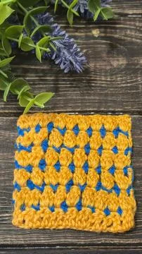 Knitting patterns with a raised pattern and yarn of different colors Stock Photos