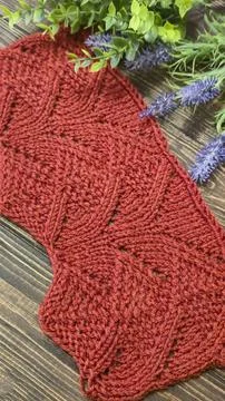 Knitting patterns with a raised pattern and yarn of different colors Stock Photos