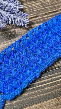 Knitting patterns with a raised pattern and yarn of different colors Stock Photos