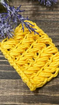 Knitting patterns with a raised pattern and yarn of different colors Stock Photos