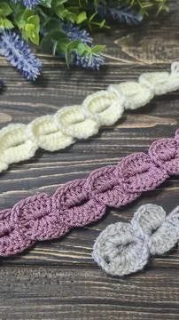 Knitting patterns with a raised pattern and yarn in different colors. Copy .. Foto stock