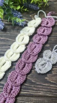 Knitting patterns with a raised pattern and yarn in different colors. Texture 스톡 사진