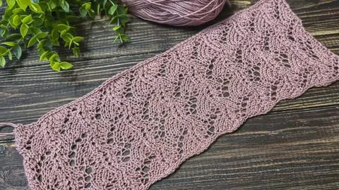 Knitting patterns with a raised pattern and yarn in different colors. Copy .. 스톡 사진