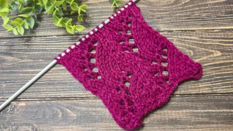 Knitting patterns with a raised pattern and yarn in different colors. Copy .. Foto stock