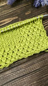 Knitting patterns with a raised pattern and yarn in different colors. Copy .. 스톡 사진