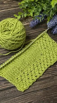 Knitting patterns with a raised pattern and yarn in different colors. Copy .. 스톡 사진
