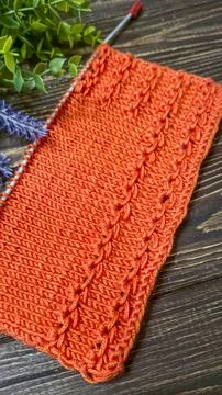 Knitting patterns with a raised pattern and yarn in different colors. Copy .. 스톡 사진