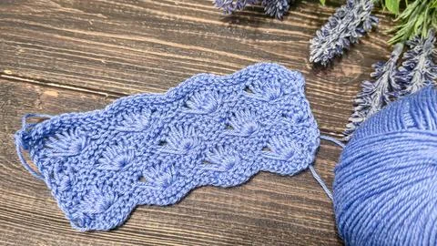 Knitting patterns with a raised pattern and yarn in different colors. Copy .. 스톡 사진