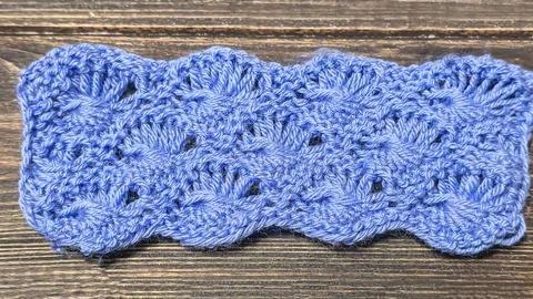Knitting patterns with a raised pattern and yarn in different colors. Copy .. Foto stock
