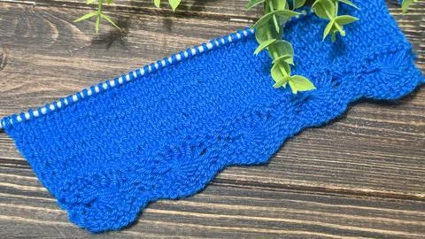 Knitting patterns with a raised pattern and yarn in different colors. Copy .. Foto stock