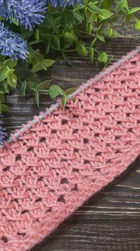 Knitting patterns with a raised pattern and yarn in different colors. Copy .. Stock Photos