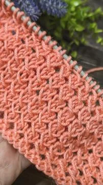 Knitting patterns with a raised pattern and yarn in different colors. Copy .. 스톡 사진