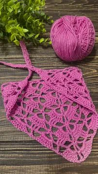 Knitting patterns with a relief pattern and yarn in different colors. Clothin Stock Photos