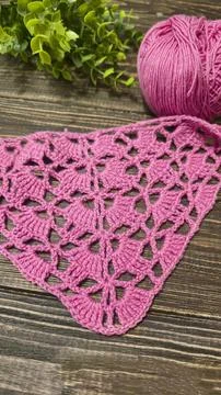 Knitting patterns with a relief pattern and yarn in different colors. Clothin Stock Photos