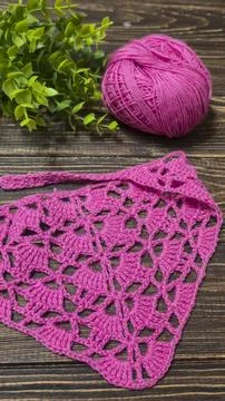 Knitting patterns with a relief pattern and yarn in different colors. Clothin Stock Photos