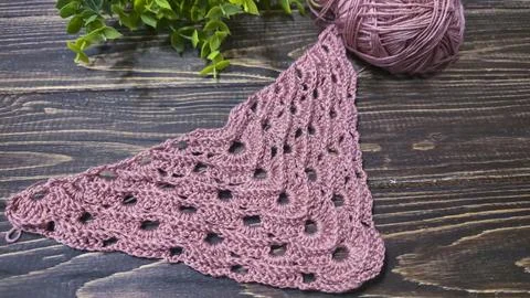 Knitting patterns with a relief pattern and yarn in different colors. Clothin Stock Photos