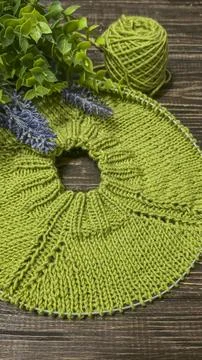 Knitting patterns with a relief pattern and yarn in different colors. Clothin Stock Photos