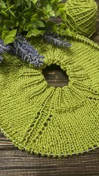 Knitting patterns with a relief pattern and yarn in different colors. Clothin Stock Photos