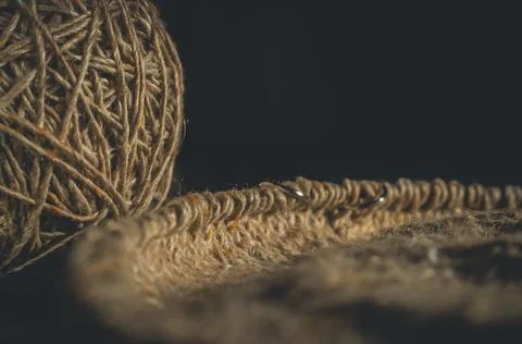 Knitting project close-up. Loops of yarn on the spokes. Knitting a warm sweater Stock Photos