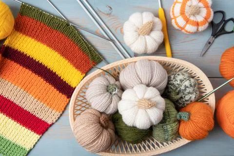 Knitting pumpkins in basket Stock Photos