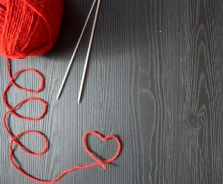 Knitting, red thread. Stock Photos