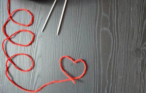 Knitting, red thread. Stock Photos