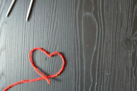 Knitting, red thread. Foto stock