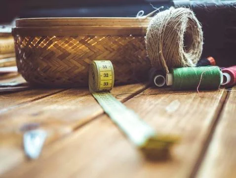 Knitting rolls and centimeter on a table Stock Photos