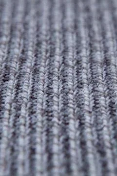 Knitting Seamless Pattern. Grey wool background. Old handmade knit Stock Photos