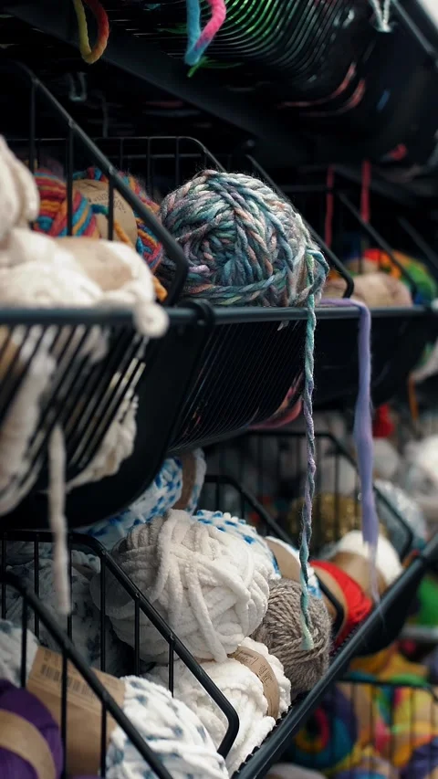 Knitting. skeins of thread in the shop. everything for handmade. bright skeins 스톡 동영상 314113256