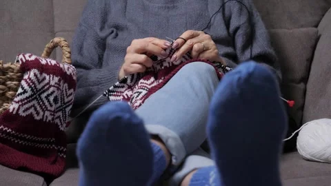 Knitting sweater rack focus to wool socks. Stock Footage 263611135