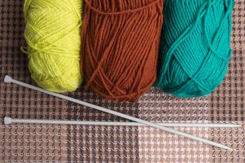 Knitting threads with knitting. Wool yarn for knitting. Stock Photos