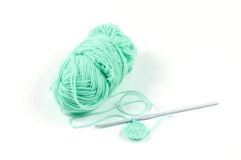 Knitting. Turquoise threads and hook. High quality photo Stock Photos