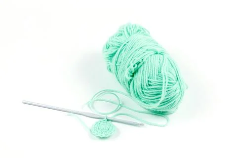 Knitting. Turquoise threads and hook. High quality photo Stock Photos