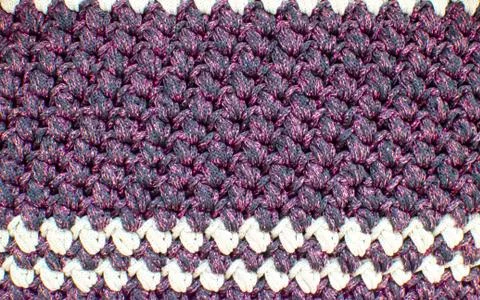 Knitting violet rope background Stock Photos
