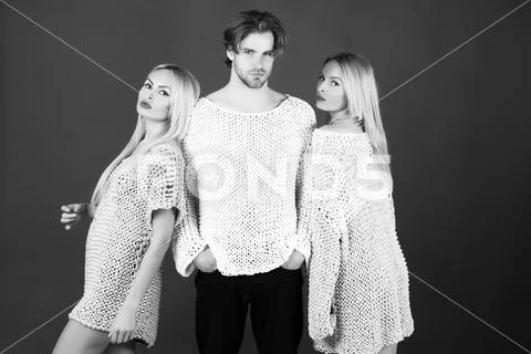Knitting wear. Young stylish people in fashionable sweaters Stock Photos