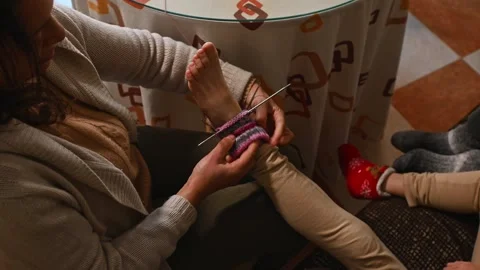 Knitting woolen socks at home Stock Footage 297510404
