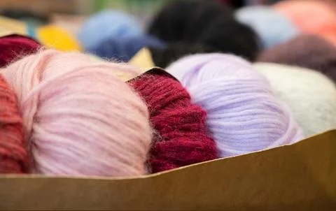 Knitting yarn. Balls of woolen threads for handmade winter clothes. Colorful Stock Photos