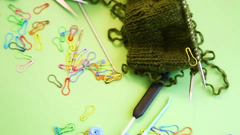 Knitting yarn with needles and tools flat lay crafting concept Stock Footage 330951116