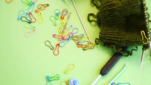 Knitting yarn with needles and tools flat lay crafting concept Stock Footage 334129026
