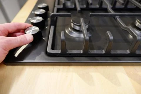 Knob control the position of modes for cooking in the oven. Close-up view from Stock-Fotos