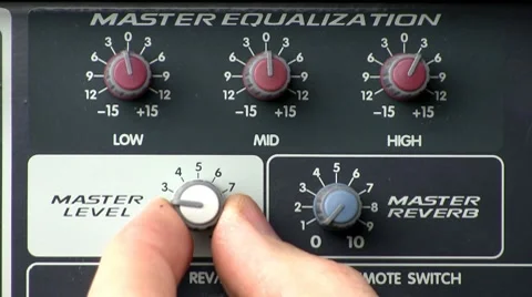 Knob turn; powered audio mixer master level, reverb, equalizer Stock Footage 10592214