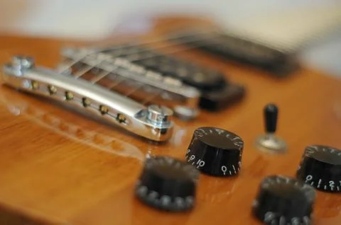 Knobs and buttons - Closeup shot of Washburn Idol WI-64 electric guitar with Stock Photos