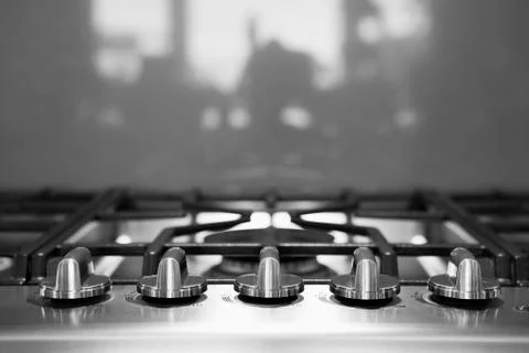 Knobs to control stove top Stock Photos