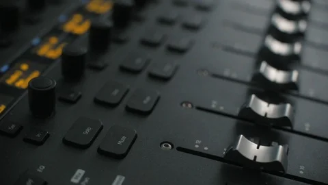 Knobs of dgital audio workstation mixer console for sound production Stock Footage 89817161