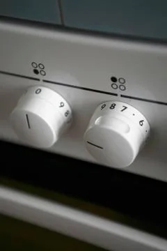 Knobs on a stove Stockfoto's