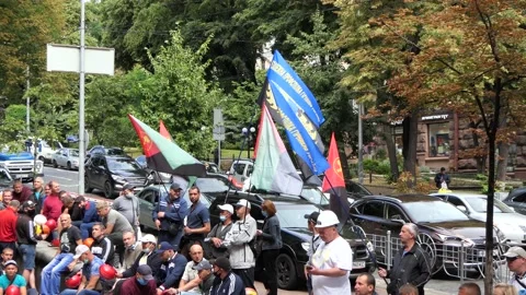 Knock, helmets on a sit-in, action, picket, rally, rebellion of miners. Stock Footage 134633504