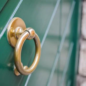 Knocker to brass ring Stock Photos