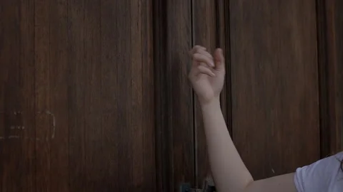 Knocking on the door, the closed door, no one at home, unplanned guests High Stock Footage 155837256