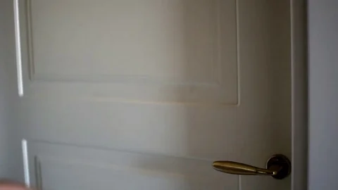 Knocking on door hand Stock Footage 76928571